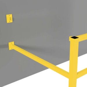 Gelbes Metall-Rammschutz-Geländer mit zwei Halterungen an grauer Wand, schräg nach außen montiert, Wandadapter sichtbar.